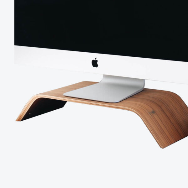 Curved walnut monitor stand